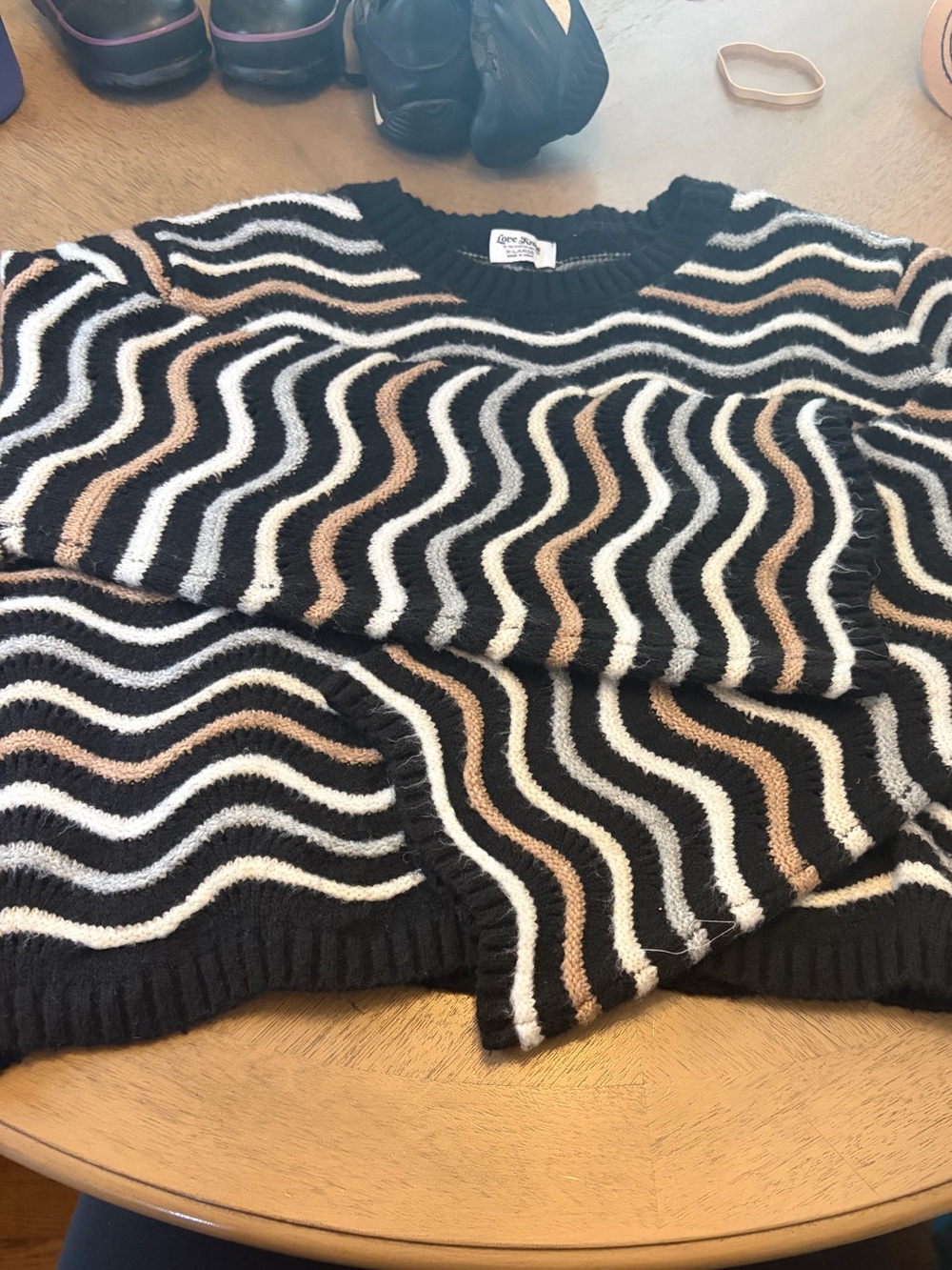 Women’s Black Wave Stripe Sweater with White and Brown Accents